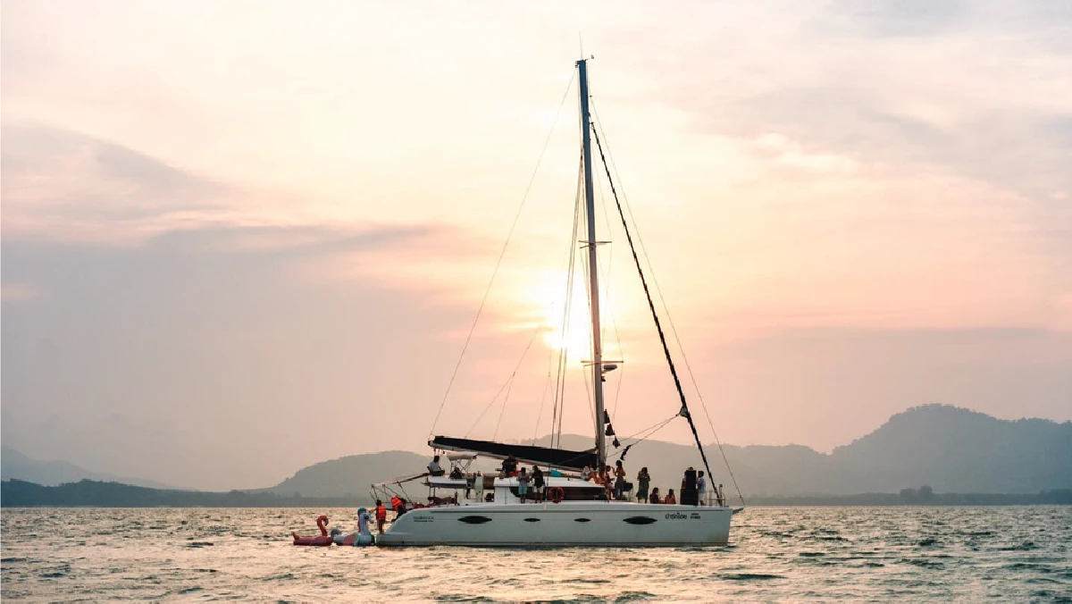 Sunset at Promthep Cape by Sailing Yacht with light dinner